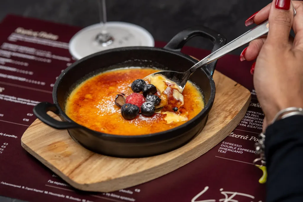 Crème brûlée with mixed berries in a mini pan at Memories L’Entrecôte’s Restaurant Rooftop, Rise Urban Art Hotel, Larnaca Cyprus