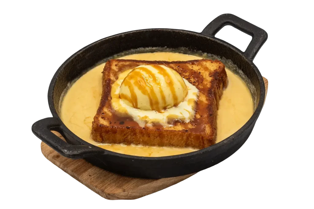 Pain perdu with vanilla ice cream and caramel sauce at L'Entrecôte Restaurant by Memories Rooftop in Larnaca