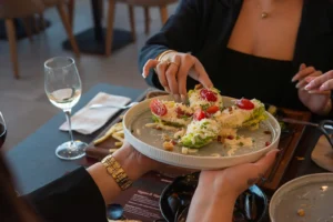 Fresh Caesar salad served during dinner at Memories L’Entrecôte’s Restaurant Rooftop