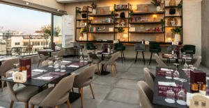 Stylish interior of Memories Rooftop Restaurant in Larnaca with modern décor and warm lighting