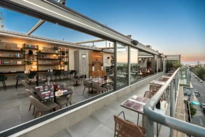 Exterior evening view of Memories Rooftop Restaurant terrace overlooking Larnaca